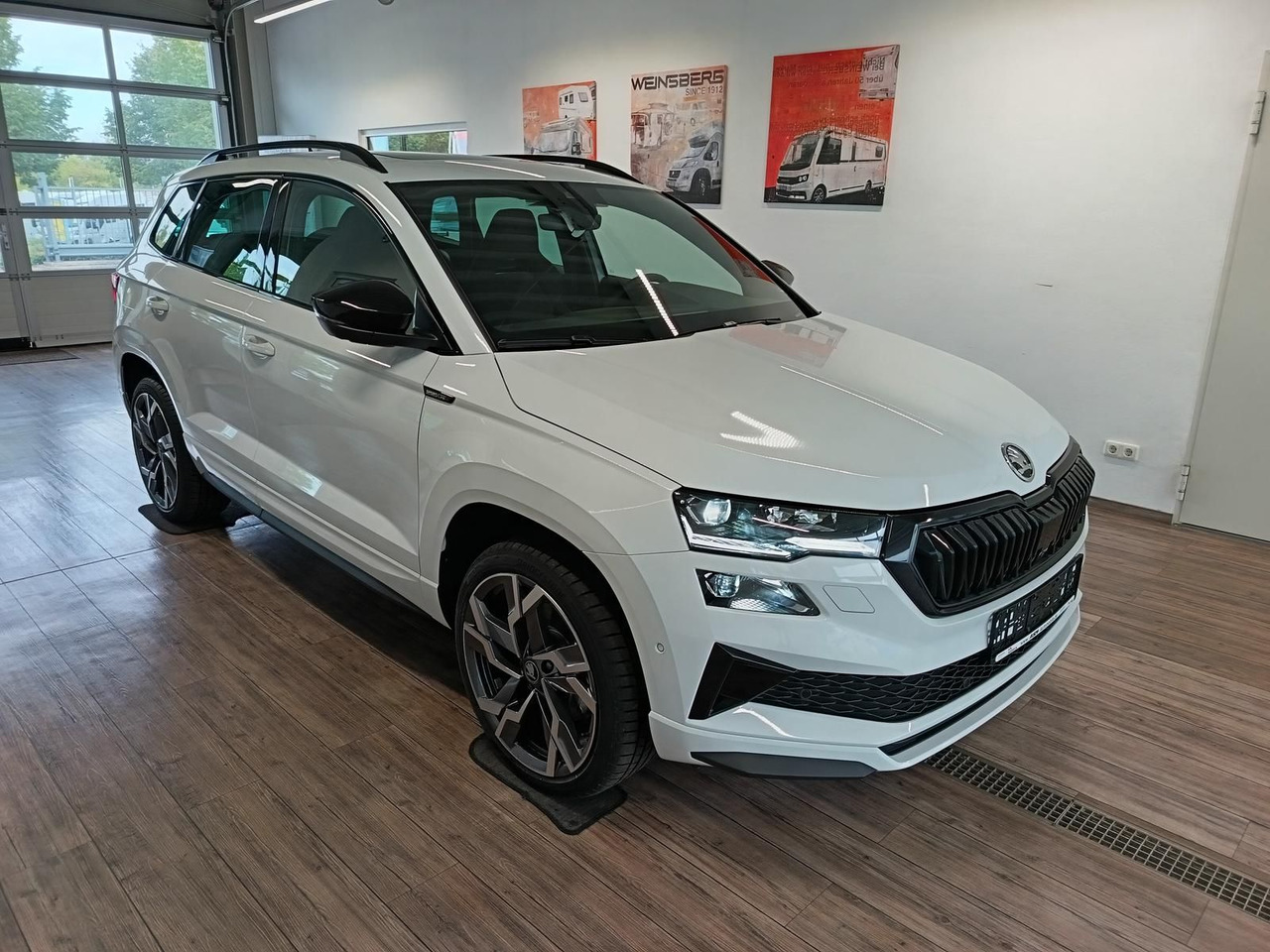 Skoda Karoq Sportline 1,5 TSI DSG*AHK*PSD*STD.HZG*NAVI - سيارة دفع رباعي: صورة 3 Skoda Karoq Sportline 1,5 TSI DSG*AHK*PSD*STD.HZG*NAVI - سيارة دفع رباعي: صورة 3