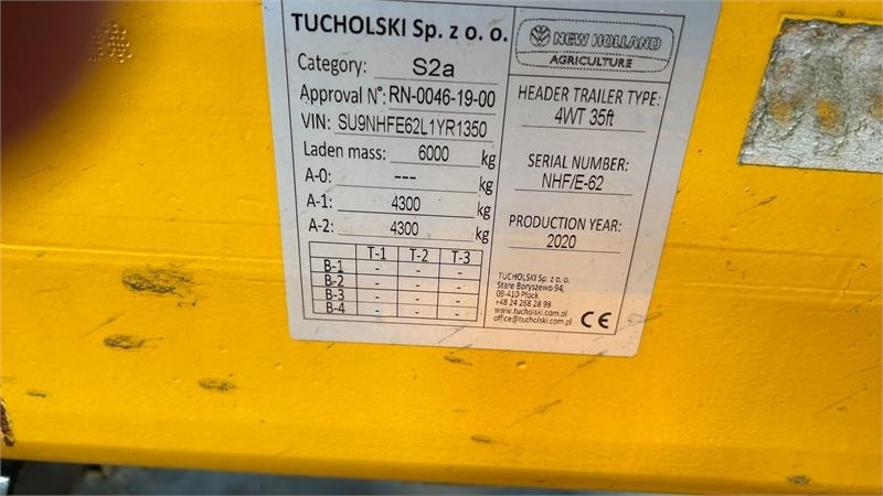 New Holland 4 hjulet skærebordsvogn - مقطورة رزاعية: صورة 3 New Holland 4 hjulet skærebordsvogn - مقطورة رزاعية: صورة 3