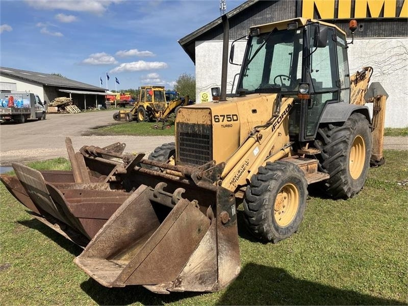 New Holland 675D - لودر ذو محراث خلفي/ باكهو: صورة 1 New Holland 675D - لودر ذو محراث خلفي/ باكهو: صورة 1