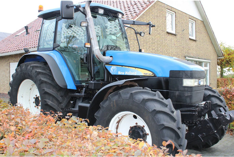 New Holland TM 140 - جرار: صورة 1 New Holland TM 140 - جرار: صورة 1