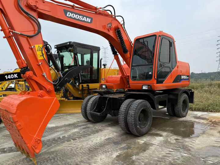 90% Brand New Doosan Brand Dh150w-7 Wheel Excavator in Stock Used Korea Brand Doosan Dh55 Dh60 Dh150 Dh210 Excavator for Sale - حفار ذو عجلات: صورة 2 90% Brand New Doosan Brand Dh150w-7 Wheel Excavator in Stock Used Korea Brand Doosan Dh55 Dh60 Dh150 Dh210 Excavator for Sale - حفار ذو عجلات: صورة 2