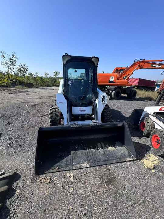 Skid Steer Loader Bobcat S550 Original Wheel Loader in Good Condition on Sale Bobcat 550 - شيول صغير: صورة 2 Skid Steer Loader Bobcat S550 Original Wheel Loader in Good Condition on Sale Bobcat 550 - شيول صغير: صورة 2