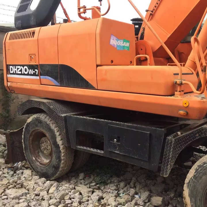 Used Digger Doosan Dh210w-7 Construction Machinery Construction Digger Used Doosan Dh210w-7 Cheap Excavator - حفار ذو عجلات: صورة 2 Used Digger Doosan Dh210w-7 Construction Machinery Construction Digger Used Doosan Dh210w-7 Cheap Excavator - حفار ذو عجلات: صورة 2