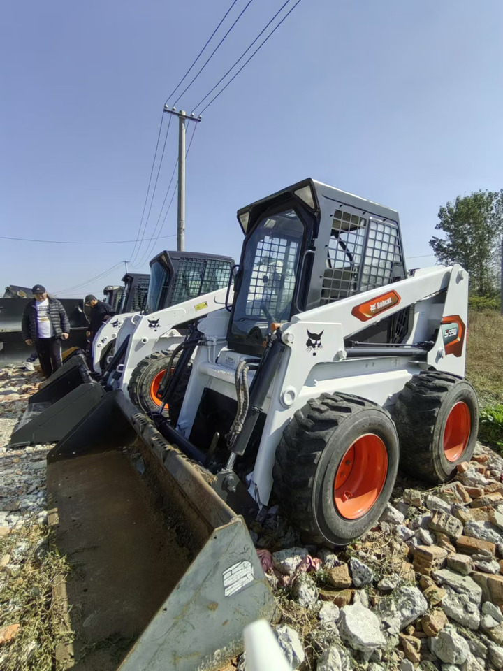 BOBCAT S590 - شيول صغير: صورة 1 BOBCAT S590 - شيول صغير: صورة 1