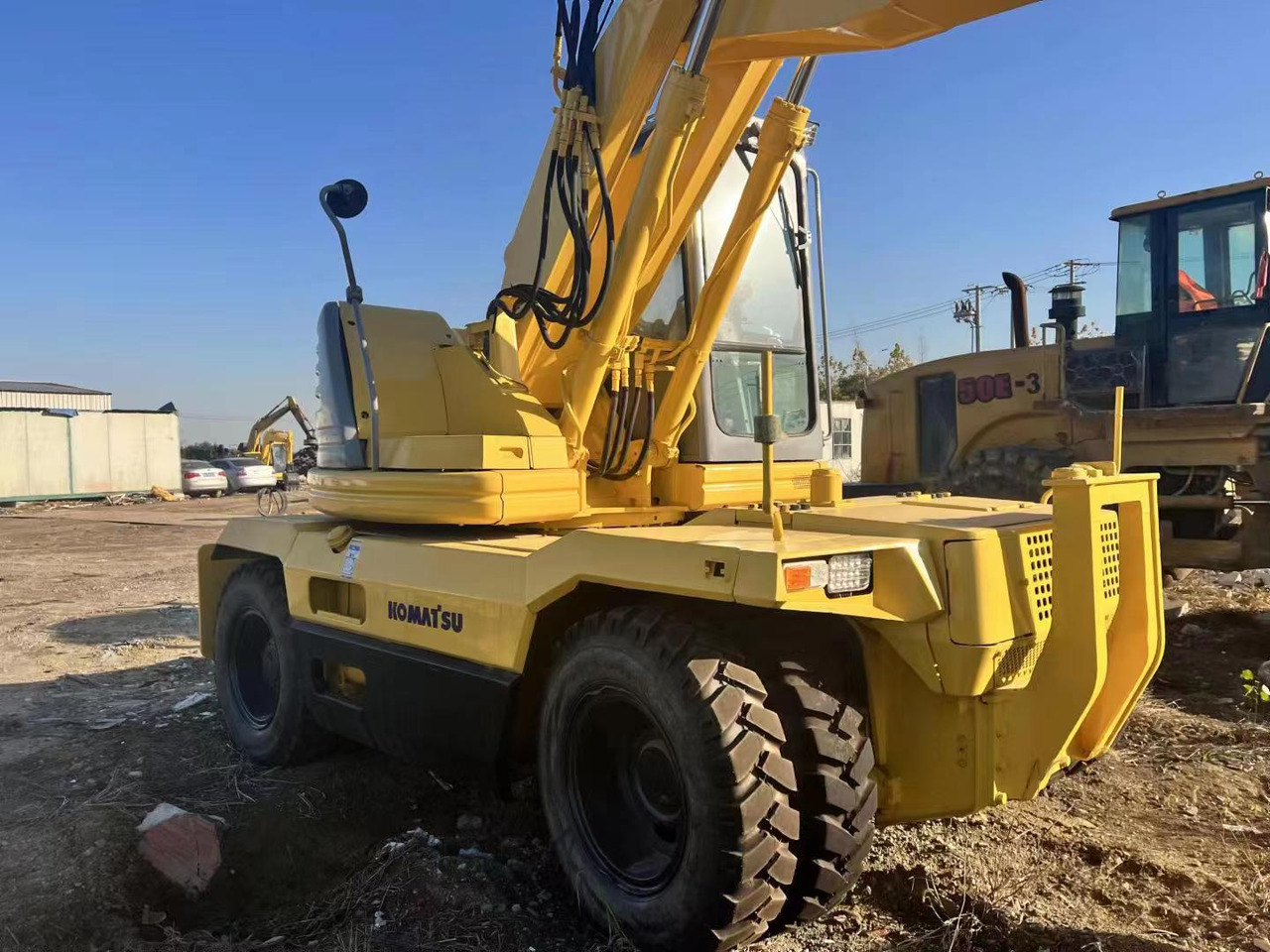 KOMATSU PC128US - حفار ذو عجلات: صورة 3 KOMATSU PC128US - حفار ذو عجلات: صورة 3