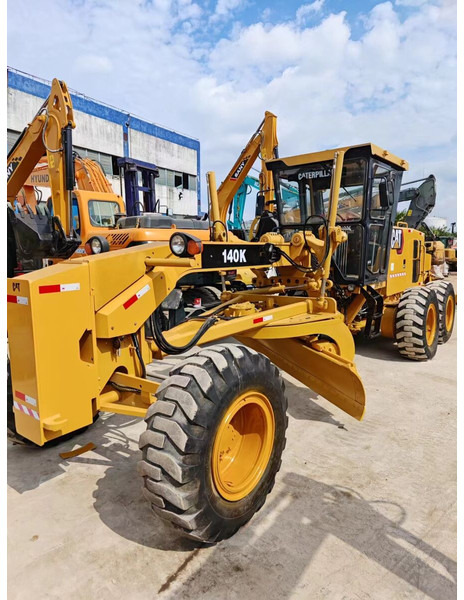 Caterpillar 140K - ماكينة تسوية: صورة 1 Caterpillar 140K - ماكينة تسوية: صورة 1