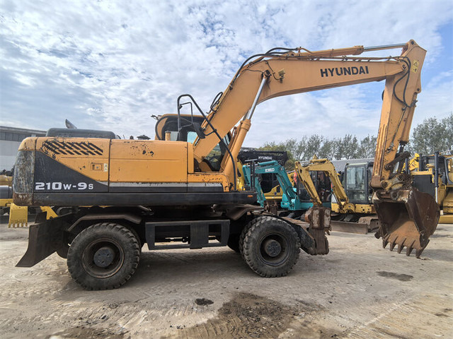 Hyundai R210W-9S - حفار ذو عجلات: صورة 1 Hyundai R210W-9S - حفار ذو عجلات: صورة 1