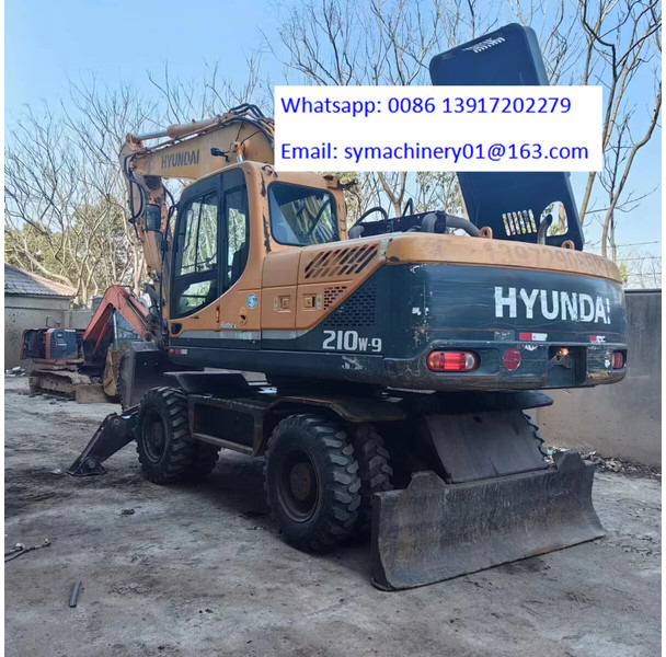 Hyundai R210W - حفار ذو عجلات: صورة 1 Hyundai R210W - حفار ذو عجلات: صورة 1