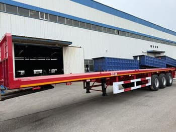 TITAN Flatbed Tri Axle Truck Trailer for Sale in Tanzania - نصف مقطورة مسطحة: صورة 1 TITAN Flatbed Tri Axle Truck Trailer for Sale in Tanzania - نصف مقطورة مسطحة: صورة 1