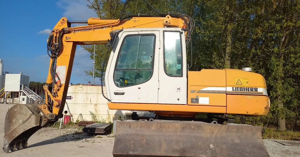 Liebherr A316 - حفار ذو عجلات: صورة 1 Liebherr A316 - حفار ذو عجلات: صورة 1