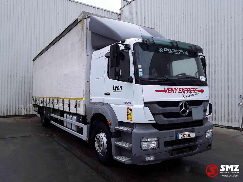 Mercedes-Benz Axor 1829 manual - شاحنة ذات ستائر جانبية: صورة 1 Mercedes-Benz Axor 1829 manual - شاحنة ذات ستائر جانبية: صورة 1