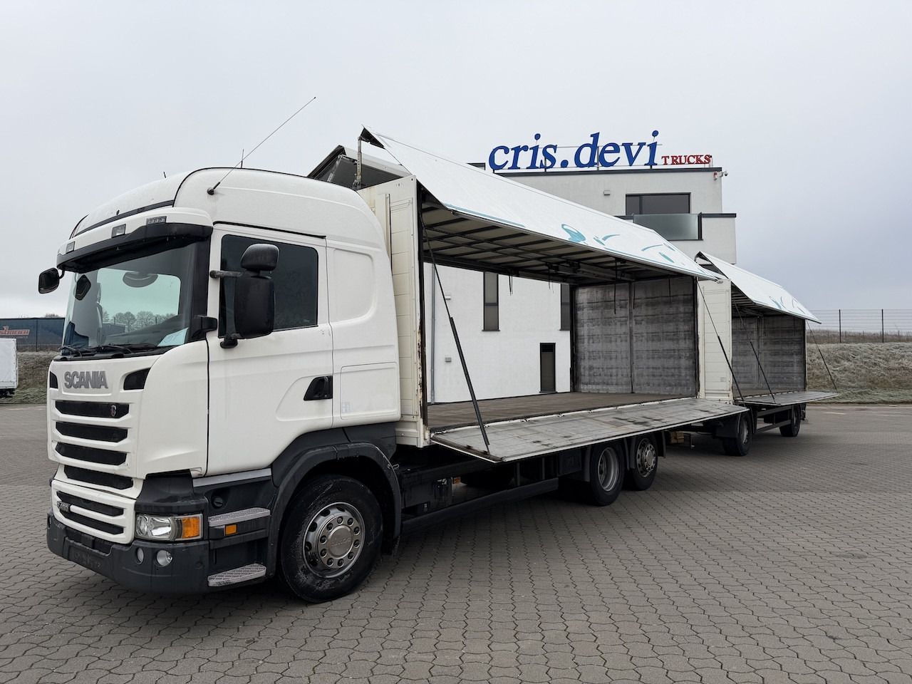 Scania R 450 6x2 Geränkezug + Orten Anhänger - شاحنة صندوقية: صورة 1 Scania R 450 6x2 Geränkezug + Orten Anhänger - شاحنة صندوقية: صورة 1
