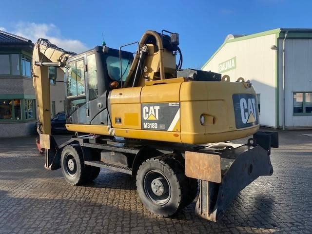 Cat M 318 D MH (12005607) - آلة التعامل مع النفايات: صورة 3 Cat M 318 D MH (12005607) - آلة التعامل مع النفايات: صورة 3