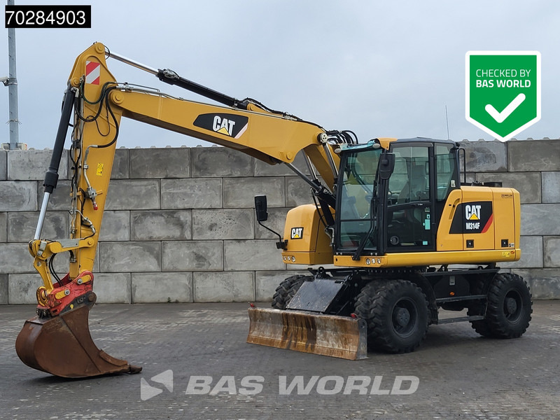 Caterpillar M314 F - حفار ذو عجلات: صورة 1 Caterpillar M314 F - حفار ذو عجلات: صورة 1