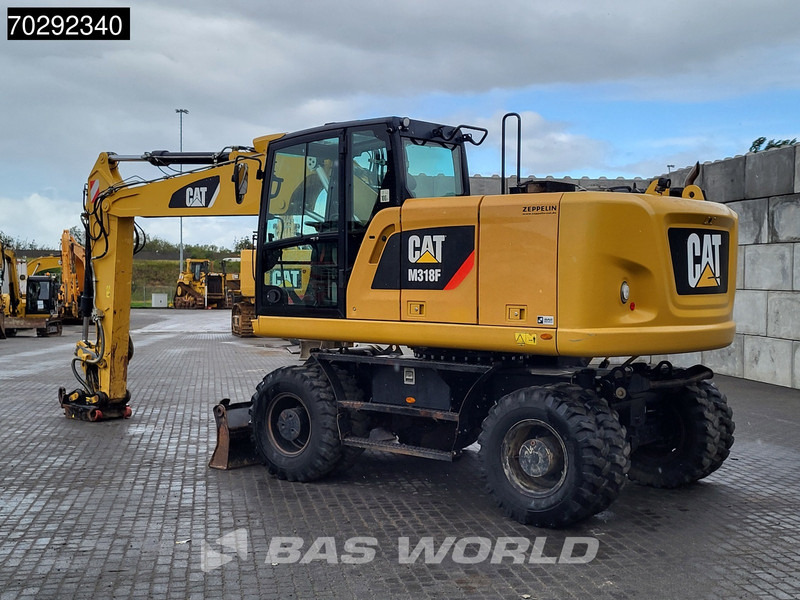 Caterpillar M318 F GERMAN MACHINE - حفار ذو عجلات: صورة 2 Caterpillar M318 F GERMAN MACHINE - حفار ذو عجلات: صورة 2