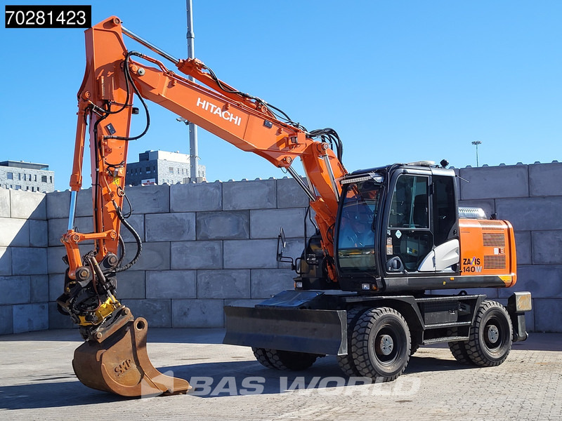 Hitachi ZX140W -5 OUTRIGGERS + BLADE - حفار ذو عجلات: صورة 2 Hitachi ZX140W -5 OUTRIGGERS + BLADE - حفار ذو عجلات: صورة 2