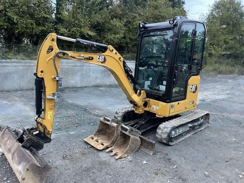 Caterpillar 302 - حفار صغير: صورة 1 Caterpillar 302 - حفار صغير: صورة 1