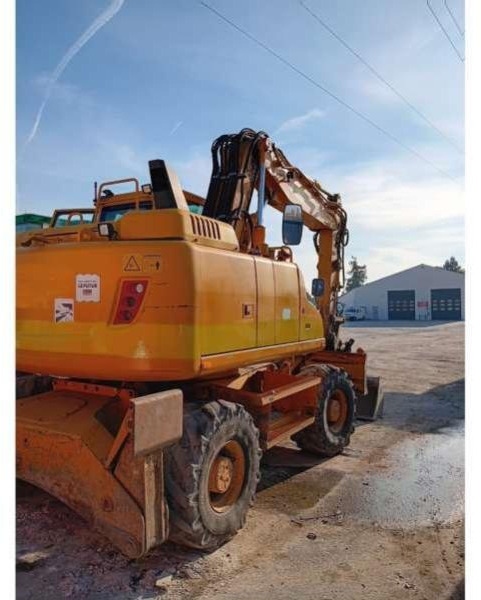 Volvo EW140D - حفار ذو عجلات: صورة 3 Volvo EW140D - حفار ذو عجلات: صورة 3