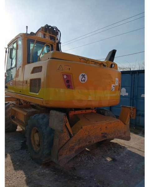 Volvo EW140D - حفار ذو عجلات: صورة 2 Volvo EW140D - حفار ذو عجلات: صورة 2