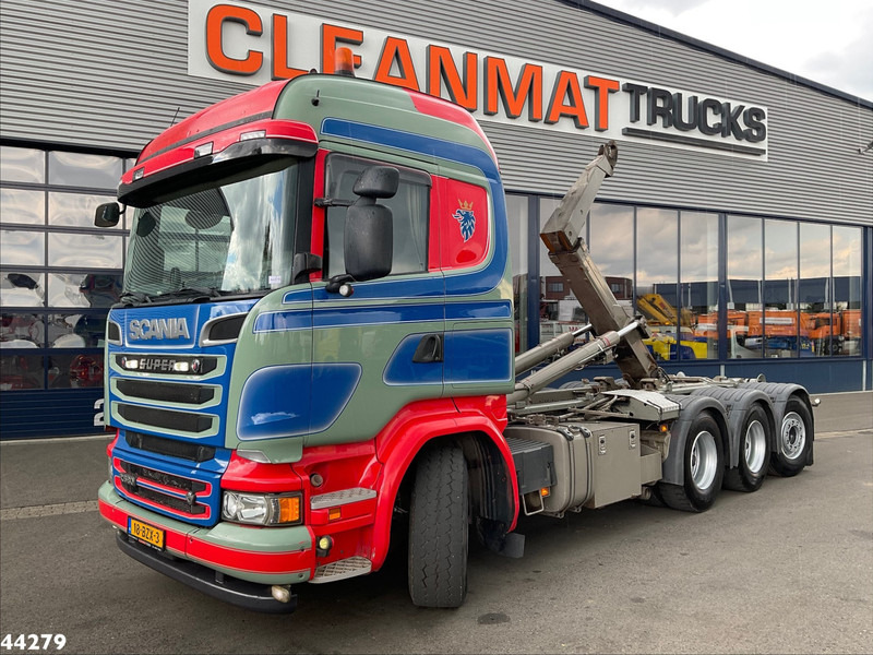 Scania R 580 Super 8x4 Euro 6 Palfinger 20 Ton haakarmsysteem - شاحنة برافعة خطافية: صورة 1 Scania R 580 Super 8x4 Euro 6 Palfinger 20 Ton haakarmsysteem - شاحنة برافعة خطافية: صورة 1