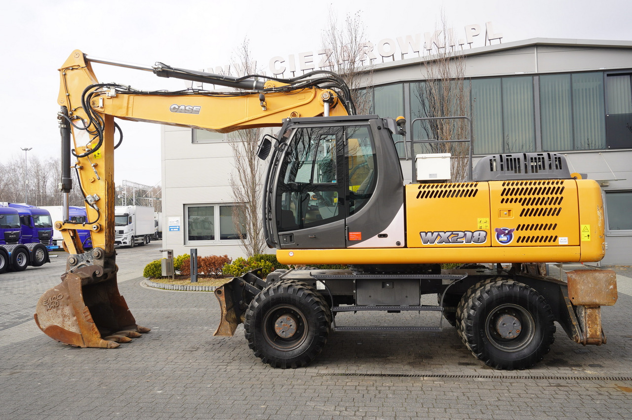 CASE WX218 / 23t wheeled excavator / 3 times folding arm - حفار ذو عجلات: صورة 1 CASE WX218 / 23t wheeled excavator / 3 times folding arm - حفار ذو عجلات: صورة 1