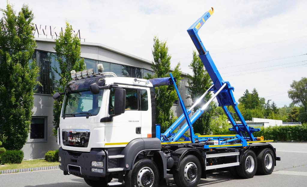 MAN TGS 35.400 8×4 HYVA LIFT 32.56 SE hooklift - شاحنة برافعة خطافية: صورة 1 MAN TGS 35.400 8×4 HYVA LIFT 32.56 SE hooklift - شاحنة برافعة خطافية: صورة 1