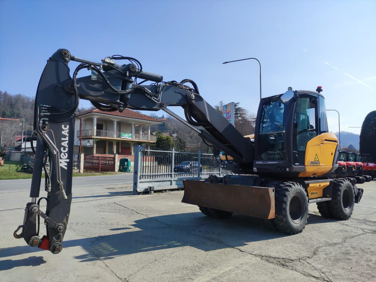 MECALAC 15 MWR - حفار ذو عجلات: صورة 1 MECALAC 15 MWR - حفار ذو عجلات: صورة 1