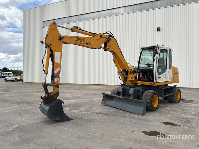 2005 Liebherr A311 Pelle Sur Pneus Wheel Excavator - حفار ذو عجلات: صورة 1 2005 Liebherr A311 Pelle Sur Pneus Wheel Excavator - حفار ذو عجلات: صورة 1