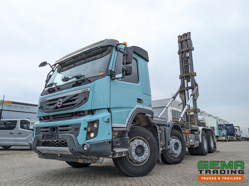 Volvo FMX410 8x4 /4 Daycab Euro5 - Haakarm 25T - CementSilo - RadioGrafisch - Hydr. Steunpoten - NaafReductie - شاحنة برافعة خطافية: صورة 1 Volvo FMX410 8x4 /4 Daycab Euro5 - Haakarm 25T - CementSilo - RadioGrafisch - Hydr. Steunpoten - NaafReductie - شاحنة برافعة خطافية: صورة 1