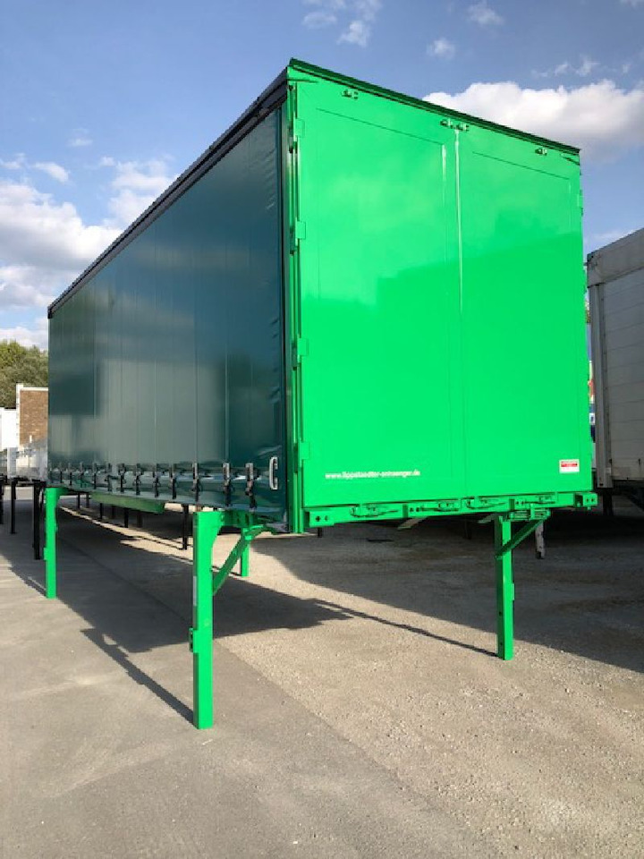 Kögel BDF-System, 7.450 mm lang - حاوية ذات ستائر جانبية: صورة 1 Kögel BDF-System, 7.450 mm lang - حاوية ذات ستائر جانبية: صورة 1
