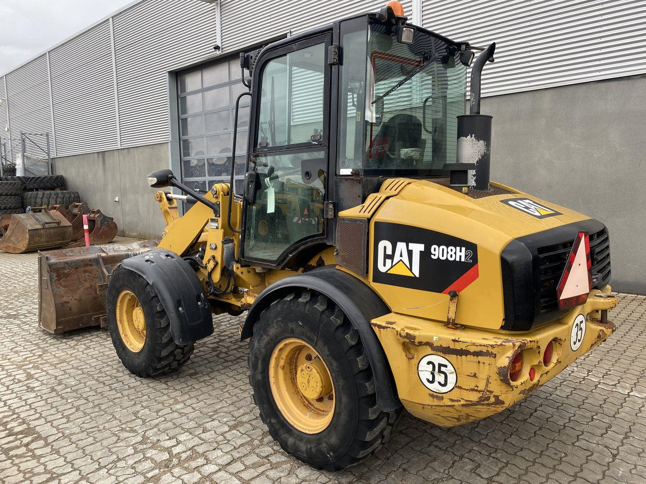 Caterpillar 908 H2 - لودر مفصلي صغير: صورة 2 Caterpillar 908 H2 - لودر مفصلي صغير: صورة 2