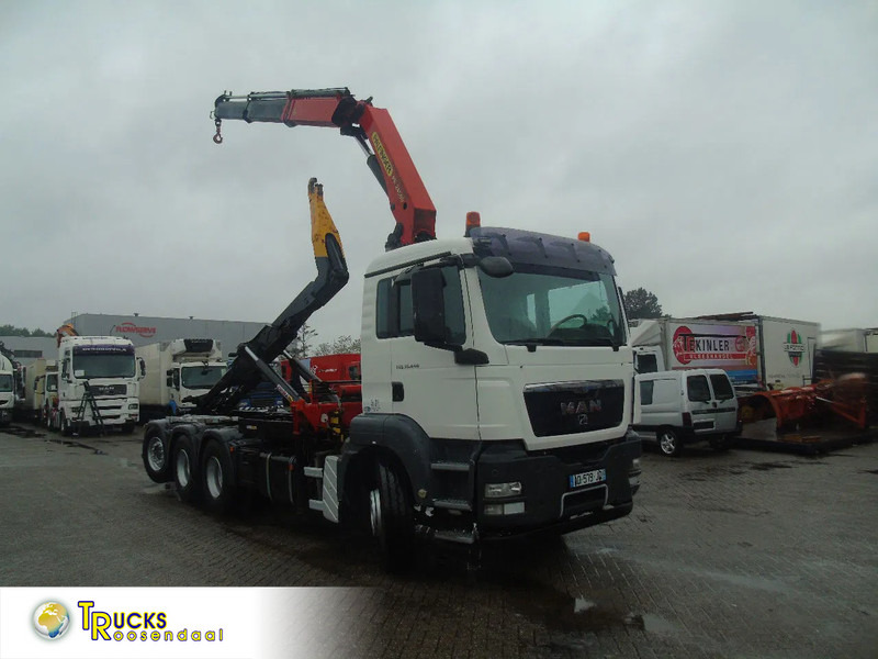 MAN TGS 35.440 + PALFINGER 24500 + 8X4 + EURO 5 + REMOTE - شاحنة برافعة خطافية, شاحنة كرين: صورة 1 MAN TGS 35.440 + PALFINGER 24500 + 8X4 + EURO 5 + REMOTE - شاحنة برافعة خطافية, شاحنة كرين: صورة 1