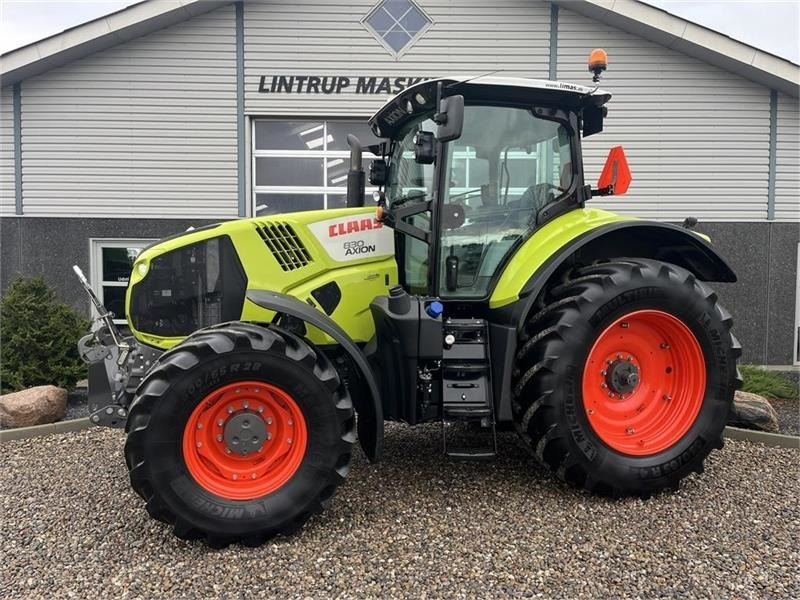 Claas Axion 830 med frontlift og front PTO - جرار: صورة 1 Claas Axion 830 med frontlift og front PTO - جرار: صورة 1