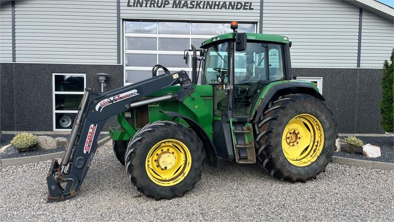 John Deere 6910 Auto Quad II-TLS Med frontlæsser - جرار: صورة 1 John Deere 6910 Auto Quad II-TLS Med frontlæsser - جرار: صورة 1