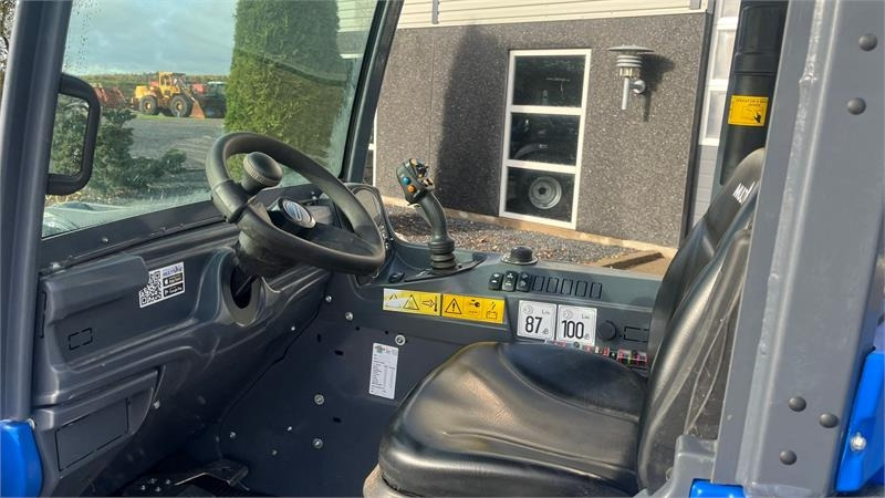 Multione 11.6 k Med pallegafler og multiskovl - لودر مفصلي صغير: صورة 4 Multione 11.6 k Med pallegafler og multiskovl - لودر مفصلي صغير: صورة 4