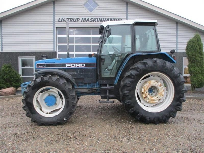 New Holland 7840 SLE, med rigtig god dæk montering og knap på - جرار: صورة 1 New Holland 7840 SLE, med rigtig god dæk montering og knap på - جرار: صورة 1