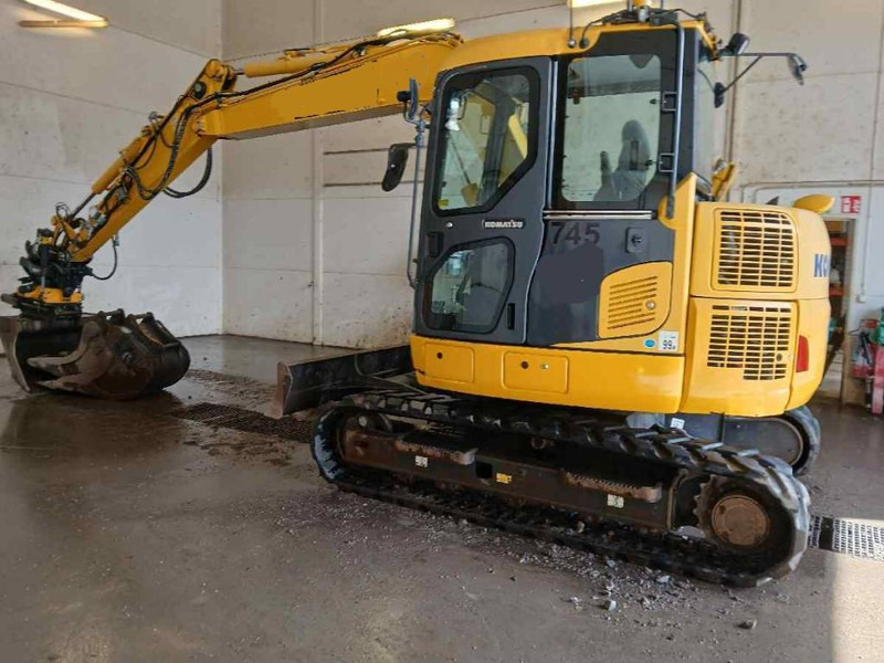 Komatsu PC78US-10 - حفار صغير: صورة 1 Komatsu PC78US-10 - حفار صغير: صورة 1