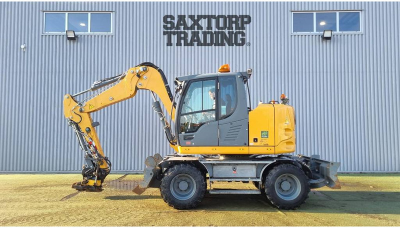 Liebherr A910 Compact, Hjulgrävare - حفار ذو عجلات: صورة 2 Liebherr A910 Compact, Hjulgrävare - حفار ذو عجلات: صورة 2
