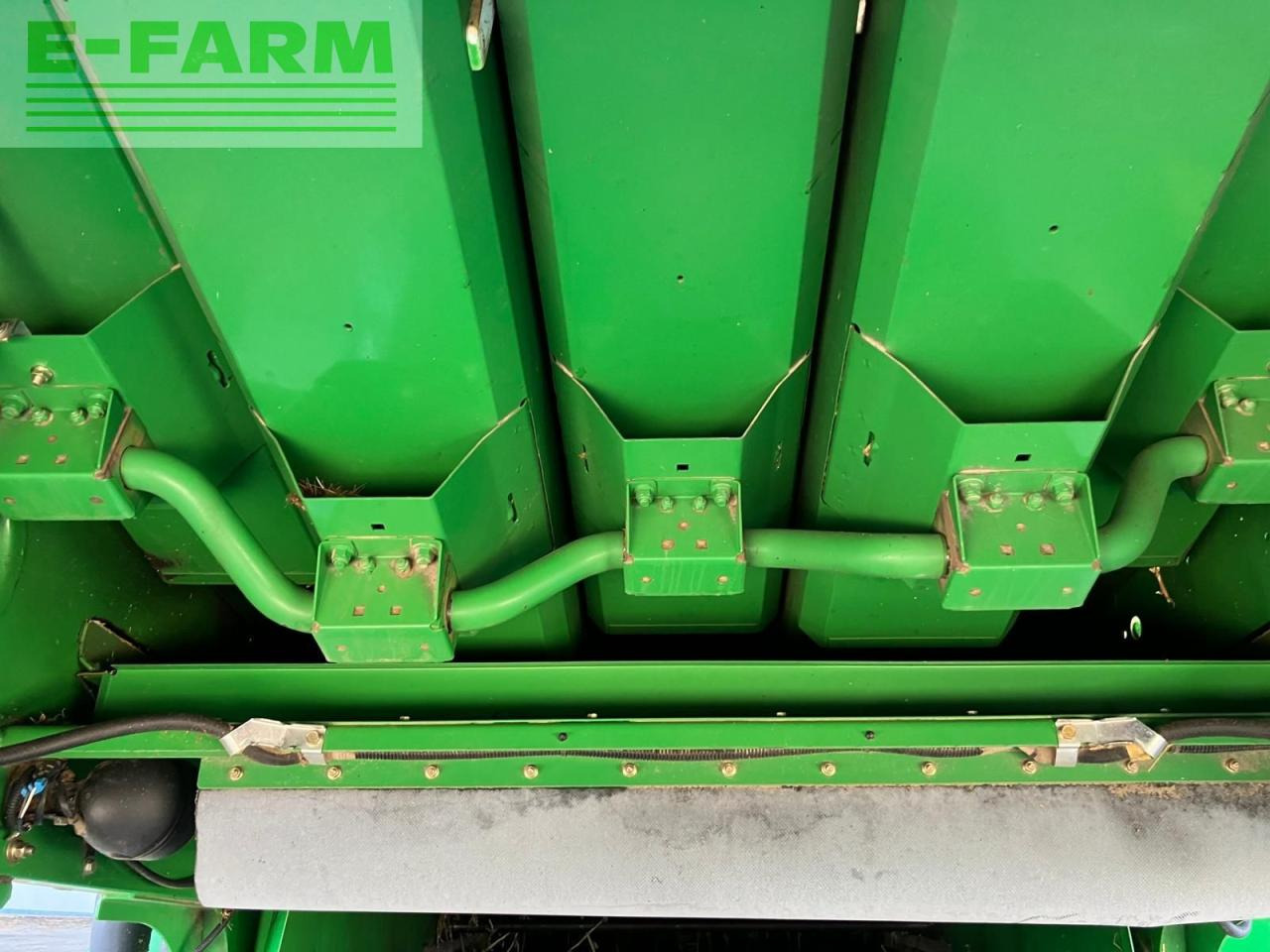 حصادة John Deere T560HM: صورة 20