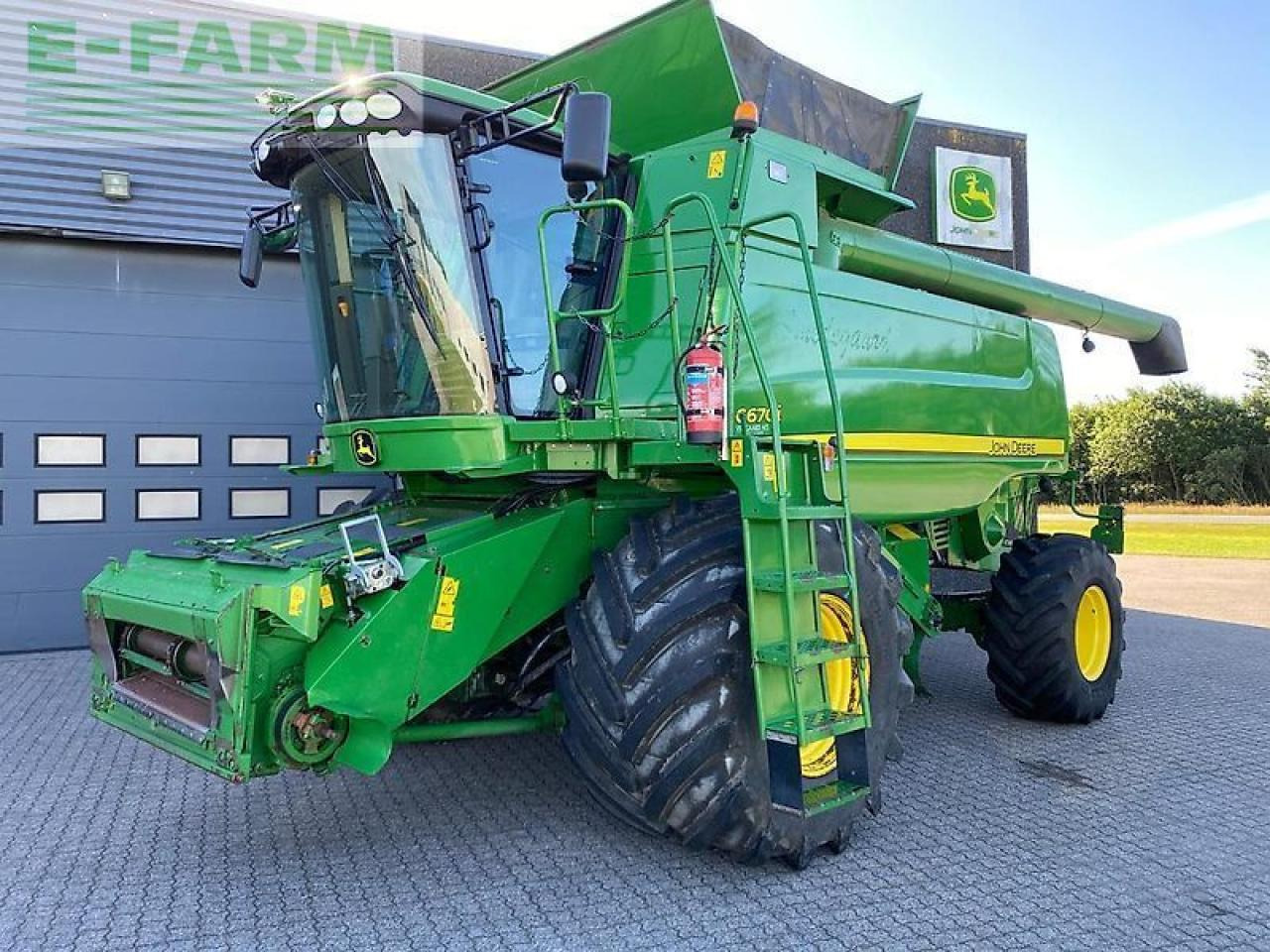 John Deere c670 - حصادة: صورة 1 John Deere c670 - حصادة: صورة 1