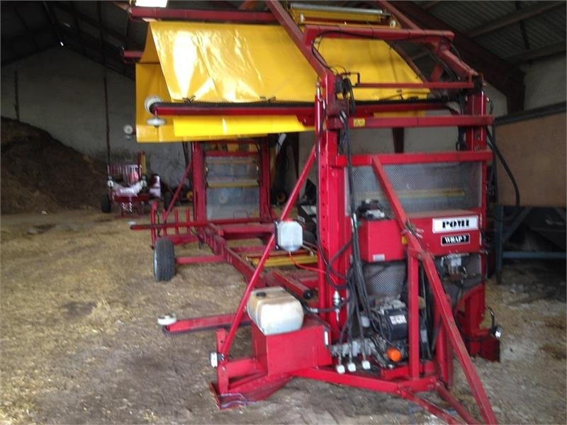 Pomi Wrap 7 - آلة لف بالات: صورة 1 Pomi Wrap 7 - آلة لف بالات: صورة 1