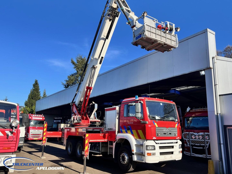MAN TGA 26.350 Magirus ALP 320L = 32 meter, Waterpomp, 6x4, Bladgeveerd - شاحنة حريق: صورة 2 MAN TGA 26.350 Magirus ALP 320L = 32 meter, Waterpomp, 6x4, Bladgeveerd - شاحنة حريق: صورة 2