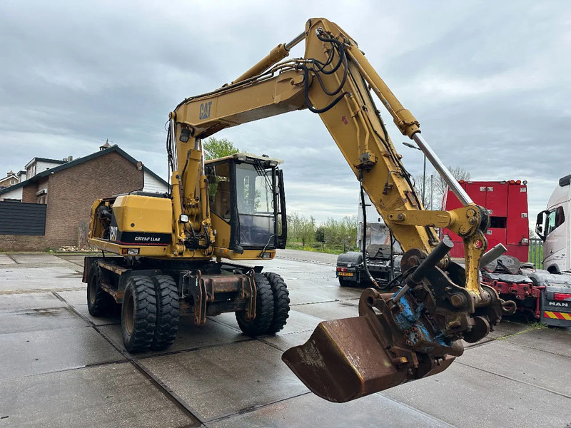 Caterpillar M315 +ROTO CE - حفار ذو عجلات: صورة 3 Caterpillar M315 +ROTO CE - حفار ذو عجلات: صورة 3