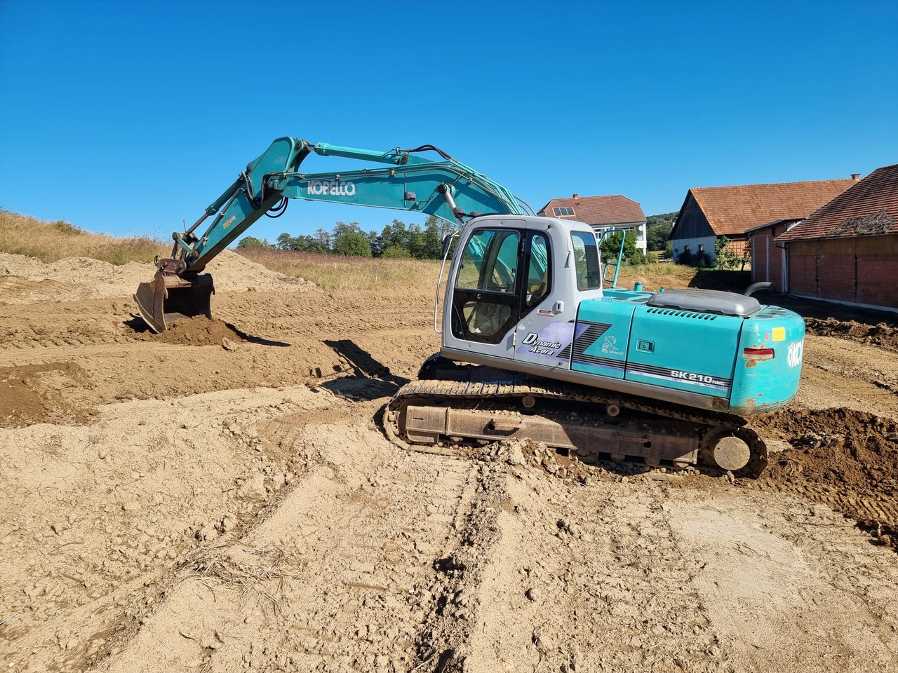 KOBELCO SK 210 NLC-6E - حفار زاحف: صورة 1 KOBELCO SK 210 NLC-6E - حفار زاحف: صورة 1