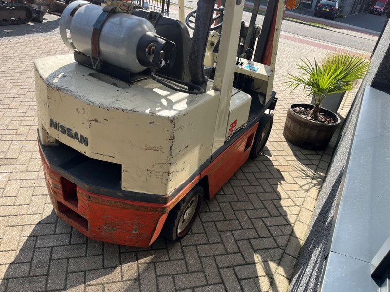 Nissan FG35U heftruck dulpo310 freelift 3e functie LPG COMPACT - رافعة شوكية تعمل بالغاز: صورة 4 Nissan FG35U heftruck dulpo310 freelift 3e functie LPG COMPACT - رافعة شوكية تعمل بالغاز: صورة 4