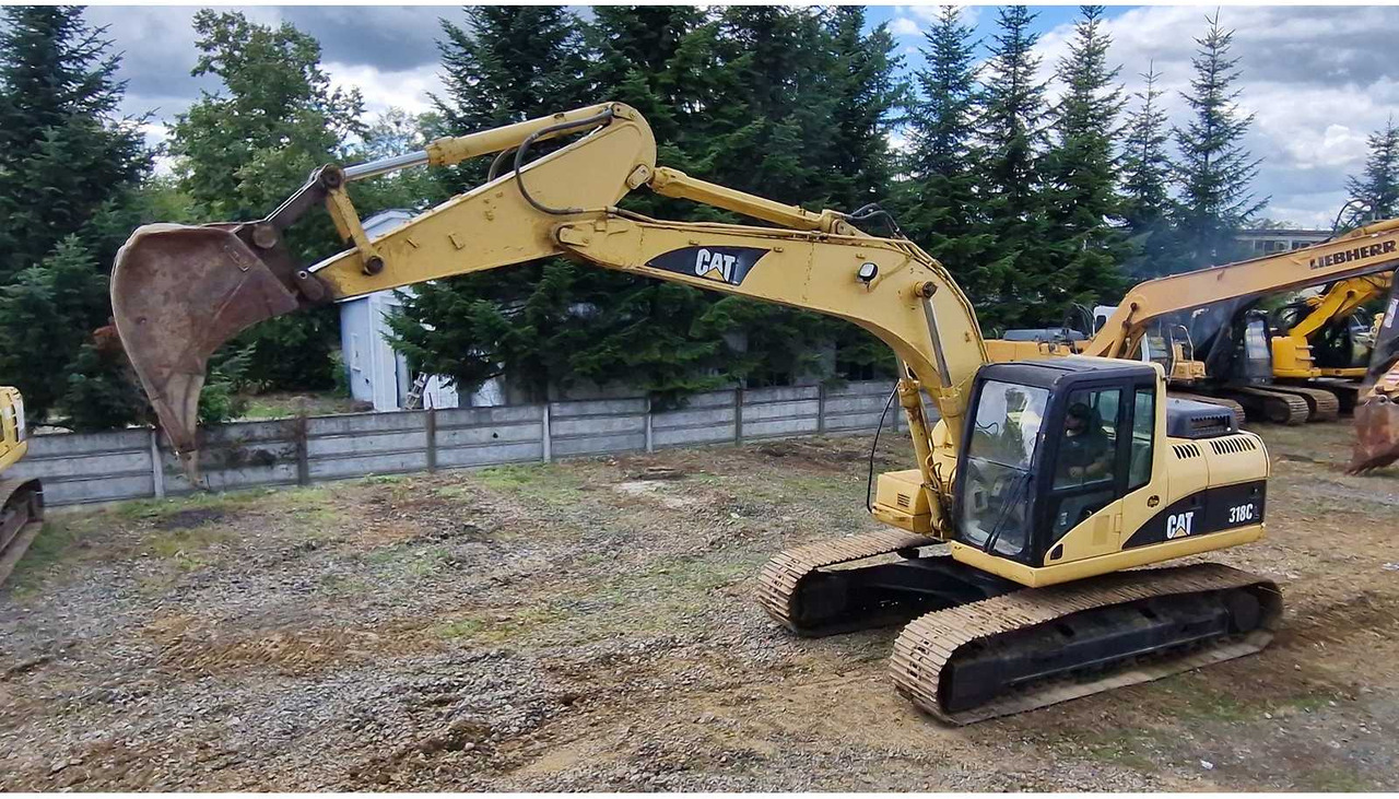 Caterpillar 318C - حفار زاحف: صورة 2 Caterpillar 318C - حفار زاحف: صورة 2