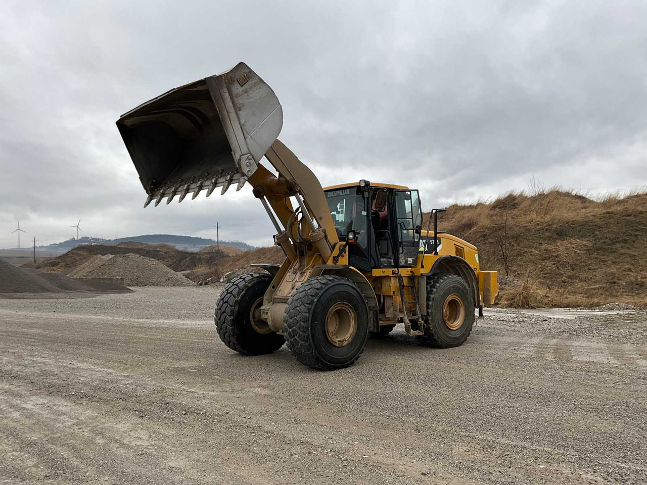 Caterpillar L972H - شيول صغير: صورة 1 Caterpillar L972H - شيول صغير: صورة 1