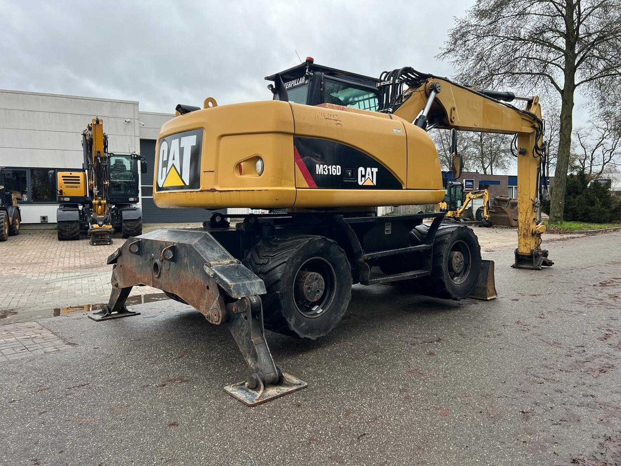 Caterpillar M316D - حفار ذو عجلات: صورة 5 Caterpillar M316D - حفار ذو عجلات: صورة 5