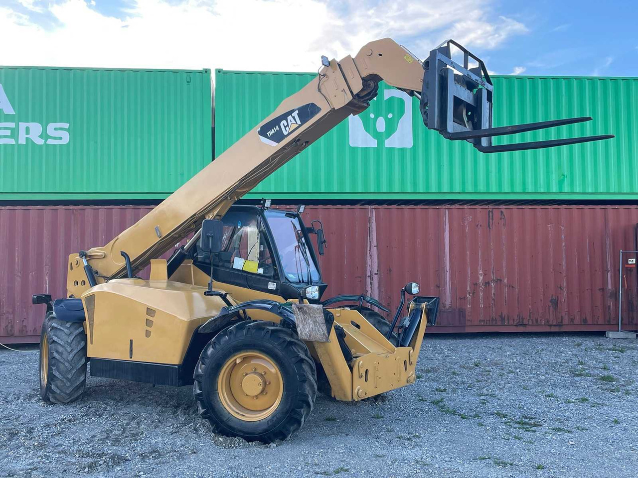 Caterpillar TH414 - اللودر بعجل: صورة 2 Caterpillar TH414 - اللودر بعجل: صورة 2