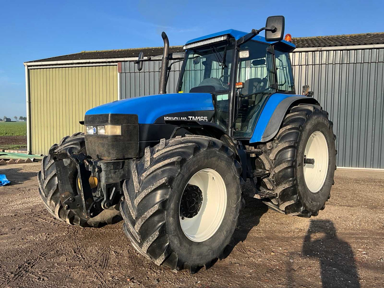 New Holland TM165 - جرار: صورة 2 New Holland TM165 - جرار: صورة 2